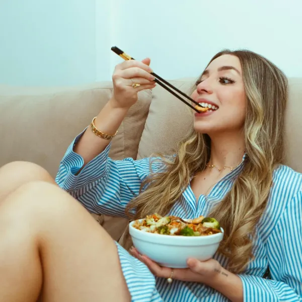 woman eating comfort food after a divorce