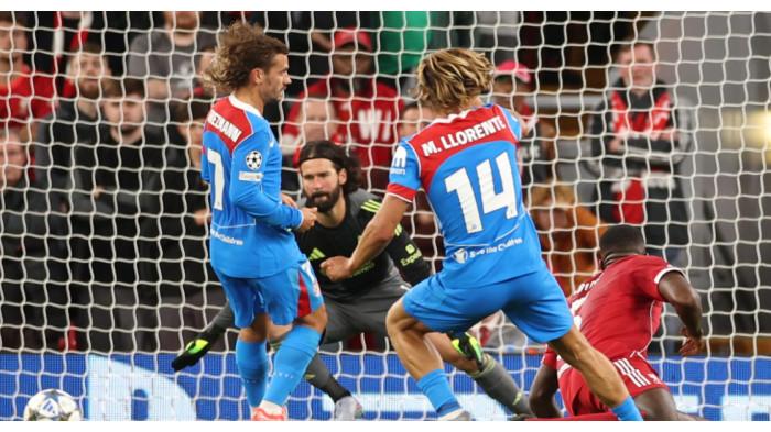 Gelandang Atletico Madrid, Marcos Llorente saat mencetak gol ke gawang Liverpool di Stadion Anfield, Kamis (18/9/2025).