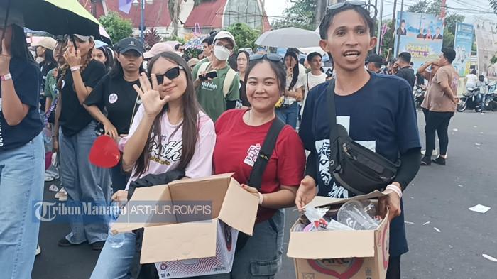 PEMUDA GMIM - Para pemuda GMIM Solafide Radey Minsel pungut sampah di jalanan Kota Manado saat Selebrasi Paskah Pemuda GMIM 2026.