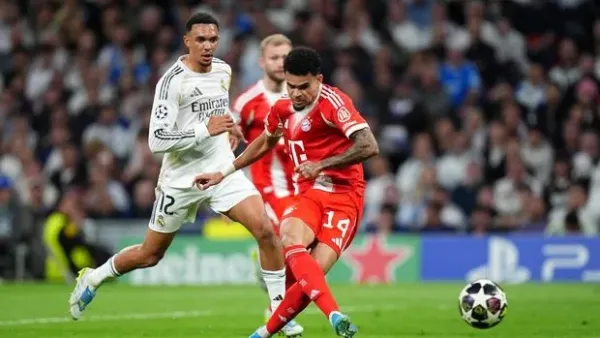 MADRID, SPAIN - APRIL 07: Luis Diaz of FC Bayern Munich scores his team's first goal during the UEFA Champions League 2025/26 Quarter-Final First Leg match between Real Madrid CF and FC Bayern München at Estadio Santiago Bernabeu on April 07, 2026 in Madrid, Spain. (Photo by Angel Martinez/Getty Images)