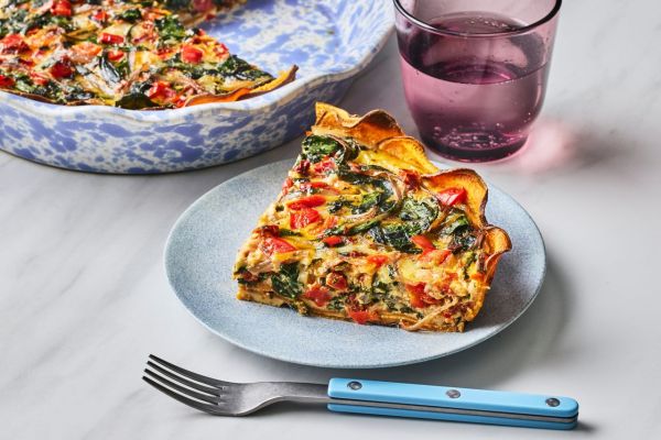 A recipe image of Sweet Potato-Crusted Quiche with Veggies. Credit: Photographer: Greg Dupree, Prop Stylist: Julia Bayless, Food Stylist: Chelsea Zimmer.