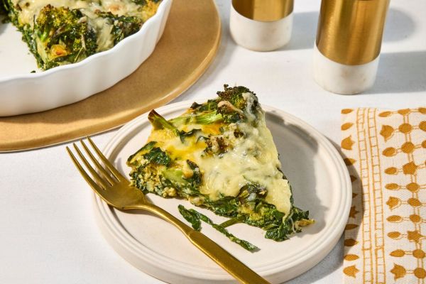 Recipe image of greens quiche Credit: photographer: Jen Causey, food stylist: Julian Hensarling, prop stylist: Josh Hoggle
