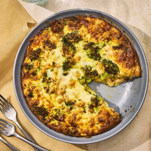 an image of the Broccoli, White Bean & Cheese Quiche Credit: Photographer: Morgan Hunt Glaze, Prop Stylist: Pricilla Montiel, Food Stylist: Chelsea Zimmer