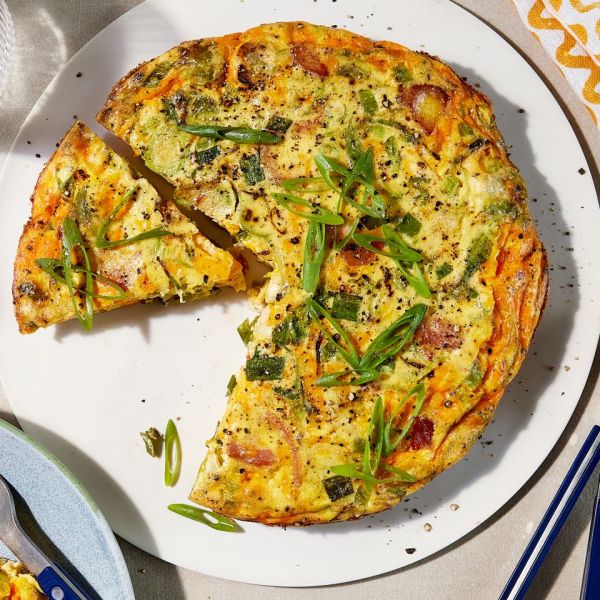 Overhead photo of Bacon & Brussels Sprouts Quiche Credit: Photographer: Jen Causey, Food Stylist: Chelsea Zimmer, Prop Stylist: Julia Bayless