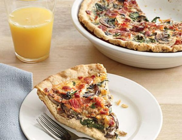 Mushroom, Gruyère, and Spinach Quiche Credit: Randy Mayor; Styling: Lindsey Lower