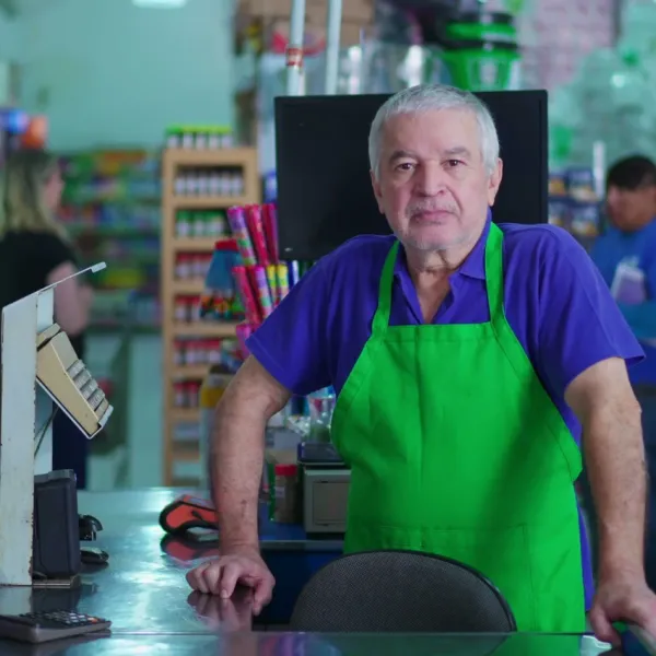 unhappy baby boomer cashier