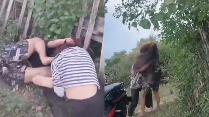 VIDEO VIRAL -- Tangkapan layar video perkelahian dua remaja wanita di Gorontalo. Keduanya saling menarik rambut hingga berguling di tanah. (Sumber: video Facebook)