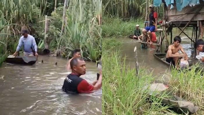 PENCARIAN PEMANCING HILANG - Sejumlah warga Desa Delas ketika melakukan pencarian terhadap warga yang hilang diduga diterkam buaya di Sungai Nyireh, Kamis (16/4/2026). Hingga kini proses pencarian masih terus dilakukan.