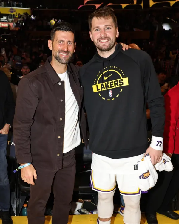 Novak Djokovic and Luka Dončić pose for a photo.