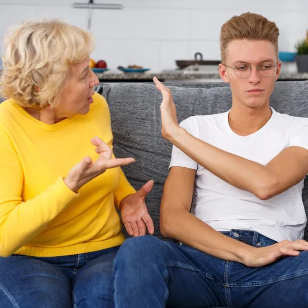 helicopter mom trying to be overbearing with her adult son