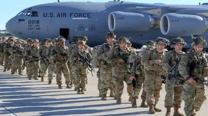 TARIK PASUKAN - Pasukan Amerika Serikat saat akan dikerahkan dalam operasi tempur. Perang Iran Vs Israel-AS akan memasuki babak baru. Donald Trump sebut akan segera tarik pasukannya.