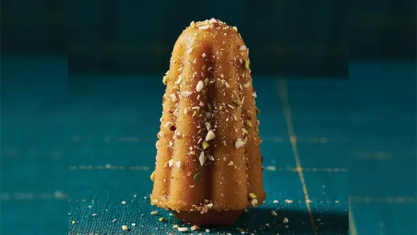 Glitched collage image with fragmented visuals of food and a person, creating a distorted, abstract composition.