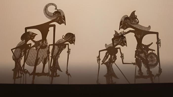 WAYANG KULIT- Ilustrasi kesenian wayang kulit yang merupakan tradisi peninggalan budaya Jawa.