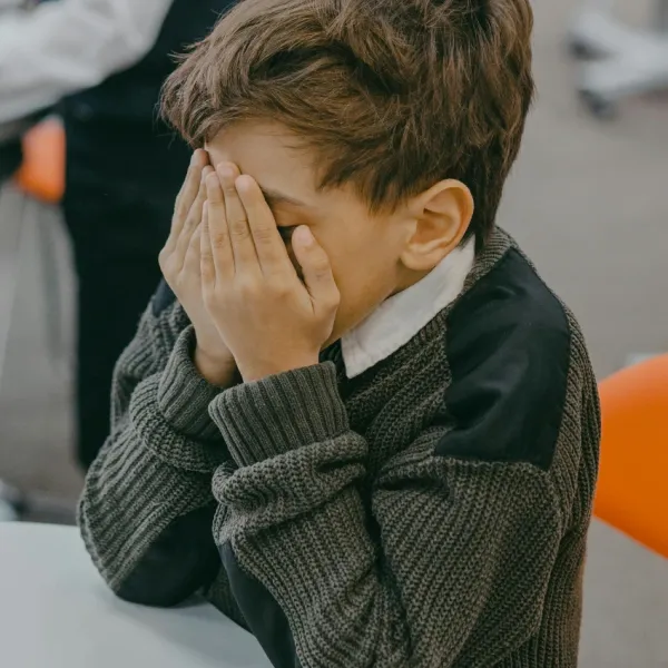 sad little boy who feels isolated at school