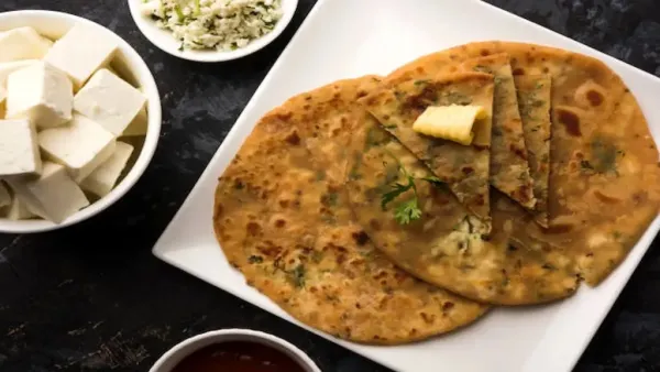 Traditional Indian paratha rich in oil and ghee, often mistaken as a healthy meal.</p>
<p>