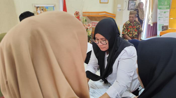 bantuan cadangan pangan pemerintah (CPP) di Aula Kantor Desa Piloliyanga