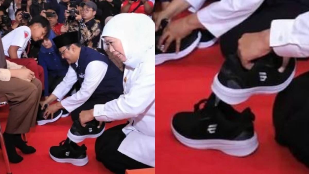 SEPATU SEKOLAH RAKYAT - Gubernur Jatim Khofifah Indar Parawansa dan Mensos Saifullah Yusuf memasangkan sepatu Stradenine ke siswa Sekolah Rakyat. Anggaran sepatu mencapai Rp 27 miliar, owner Stradenine tegaskan harganya cuma RP 179 ribu per pasang, tak kerja sama dengan kementerian terkait.