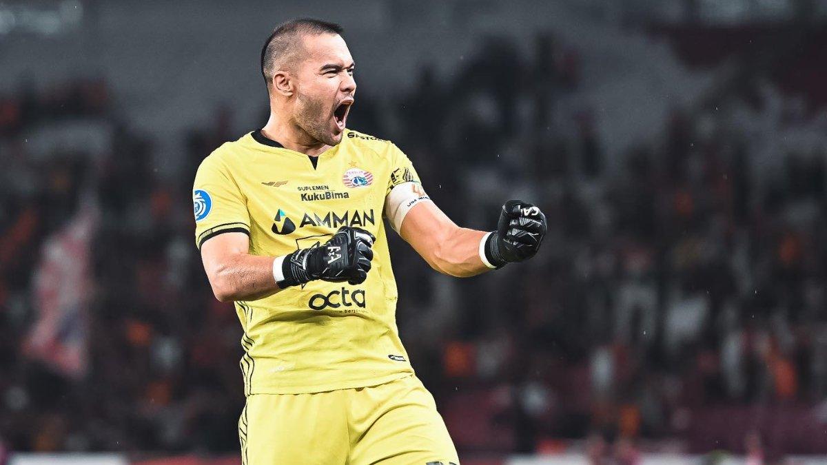 PERSIJA JAKARTA VS PERSIB BANDUNG - Sosok penjaga gawang Persija Jakarta sekaligus kapten tim, Andritany Ardhiyasa saat melakukan selebrasi gol di gelaran Liga 1.