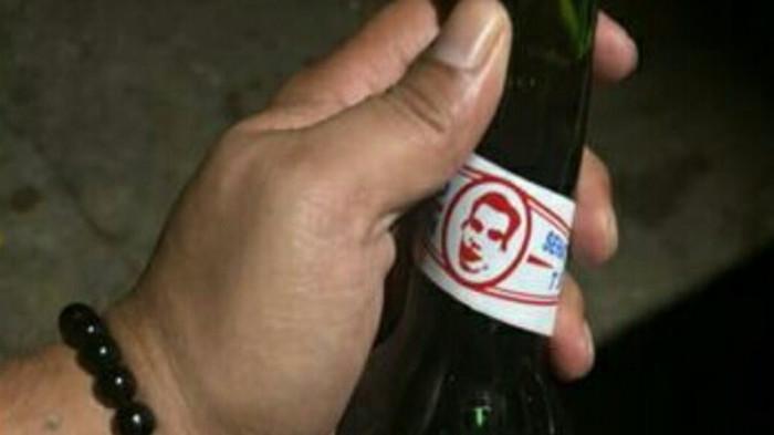 MIRAS PALSU - Botol minuman keras (miras) ilegal bermerek “Kasegaran” palsu.
