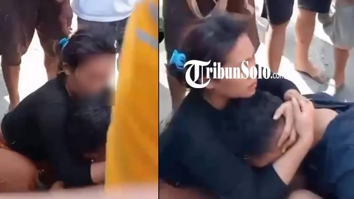 BERPELUKAN. Tangkapan layar pasangan laki-laki dan perempuan diamankan warga karena melakukan pencurian motor di jalan Solo-Purwodadi, Kabupaten Sragen, Kamis (7/5/2026). Mereka sempat berpelukan di tengah kerumunan massa.