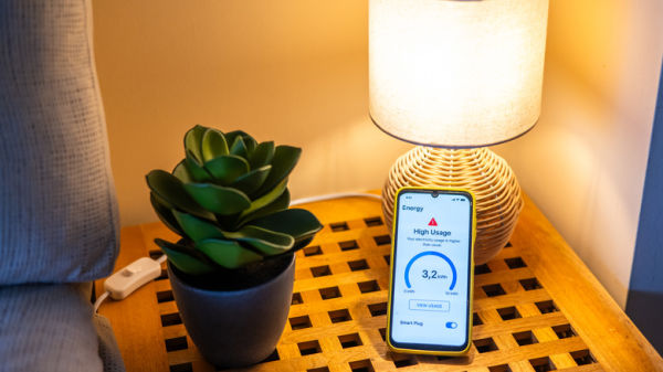 Smartphone showing high energy reading from a smart plug