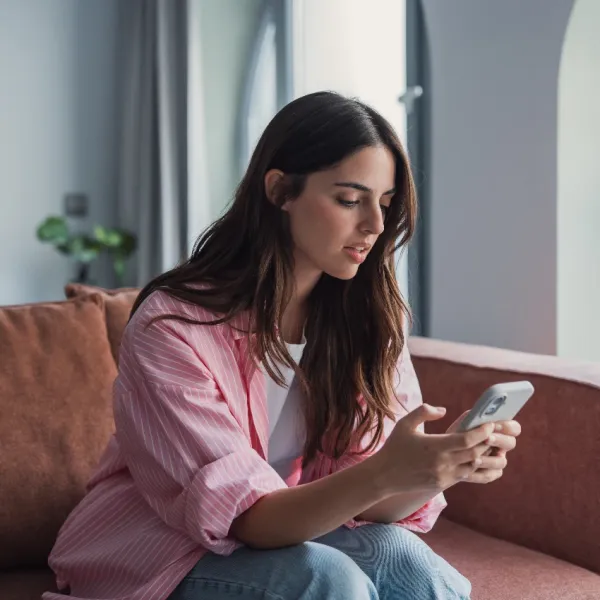 serious woman using phone
