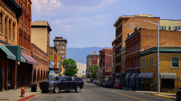 A car-lined urban street in Butte, Montana