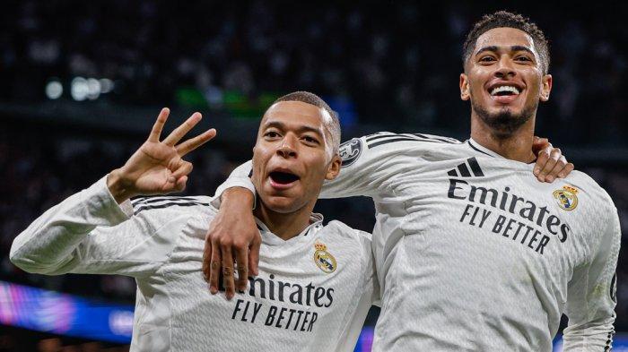 SELEBRASI MBAPE - Selebrasi penyerang Real Madrid, Kylian Mbappe (kiri) bersama Jude Bellingham (kanan) setelah mencetak gol ke gawang Manchester City pada babak play-off 16 besar Liga Champions di Santiago Bernabeu, Kamis (20/2/2025) dini hari WIB. Mbappe pecahkan rekor Lionel Messi.