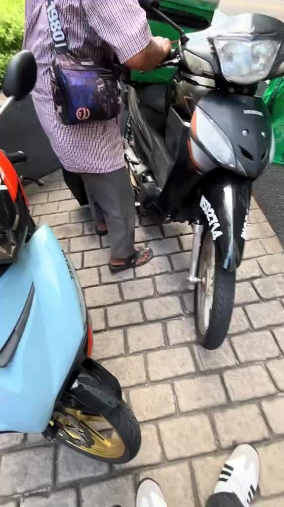 71-year-old delivery driver in Malaysia hits the road daily to support family