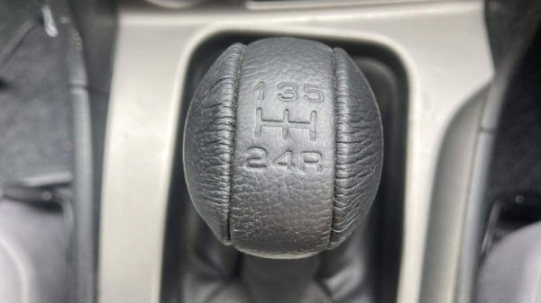 Close-up of shifter knob of 5-speed manual transmission