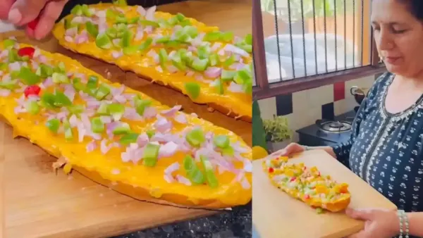 Homemade mango loaf topped with fresh bell peppers and onions being prepared on a wooden cutting board by a chef.