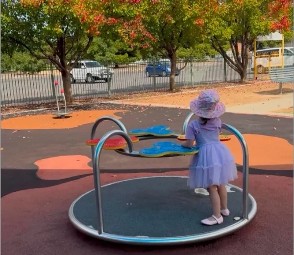 Ngo Thi Bac’s daughter at a playground in Melbourne, Australia. Photo courtesy of the family