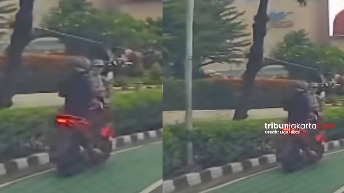 WNA DIJAMBRET DI MENTENG - Rekaman yang memperlihatkan seorang pemotor menjambret ponsel WNA di kawasan Bundaran HI, Menteng, Jakarta Pusat.Istimewa