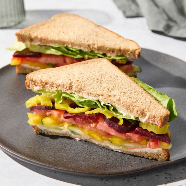 a photo of a Veggie & Cream Cheese Sandwich recipe Credit: Photographer: Jacob Fox, Food Stylist: Sammy Mila, Prop Stylist: Joseph Wanek.