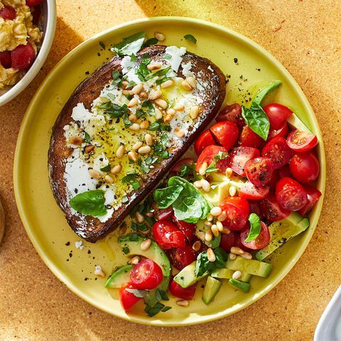 Open-Face goat cheese sandwich with tomato & avocado salad