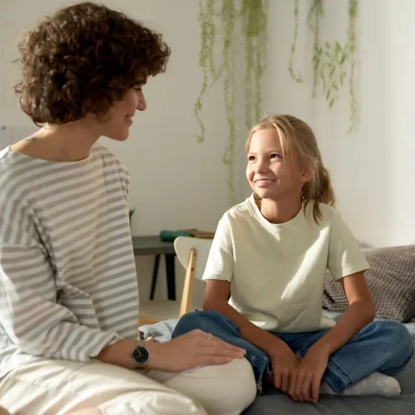 mom talking to daughter