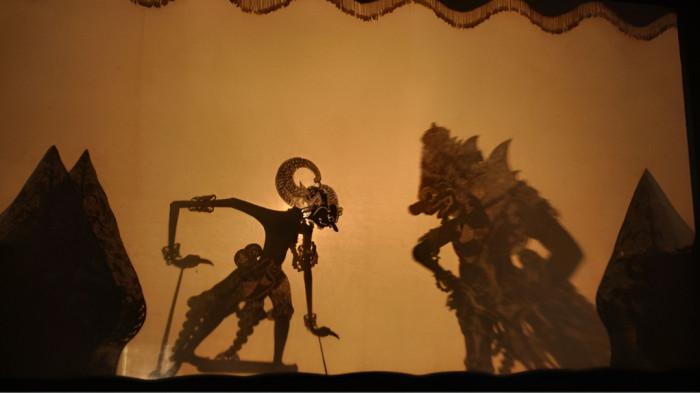 WAYANG KULIT- Ilustrasi kesenian wayang kulit yang merupakan tradisi masyarakat Jawa.
