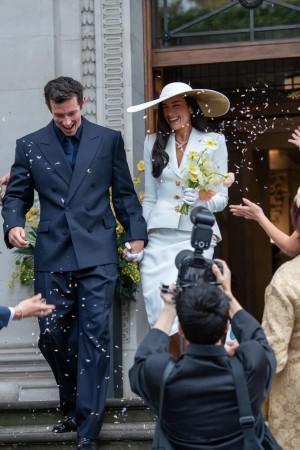 Dua Lipa ditches traditional bridal look, marries Callum Turner in chic ivory skirt suit