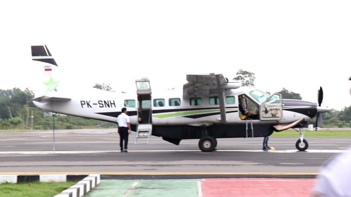 PESAWAT PERINTIS - Ilustrasi aktivitas penerbangan di Bandara Tanjung Harapan sebelum maskapai take off. (TribunKaltara.com / Desi Kartika)