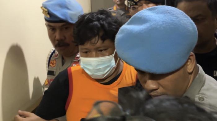 AN digelandang masuk ke sel tahanan