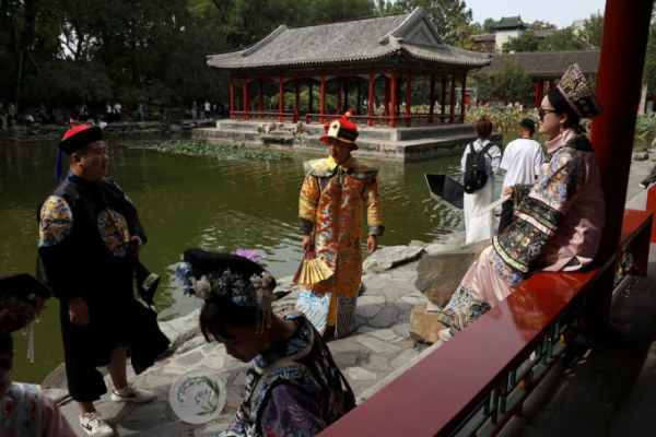 Tourists wearing Qing dynasty costumes visit Prince Kungs Mansion on National Day, the first day of Chinas eight-day Golden Week holiday, in Beijing, China October 1, 2025. Photo by Reuters