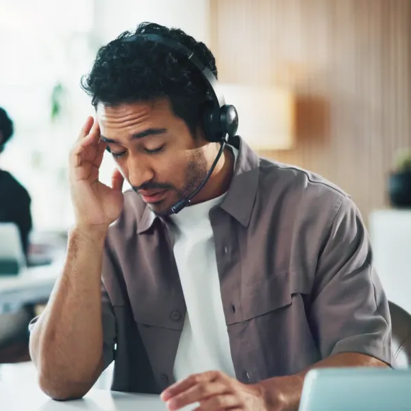 man stressed working at call center hates job but stays for financial reasons