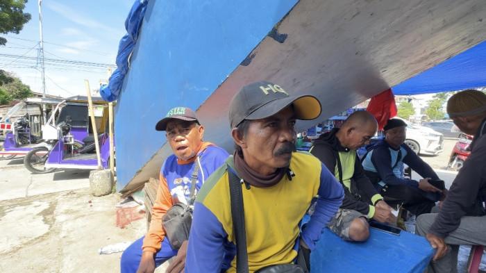 Pengemudi becak motor (bentor) di pangkalannya di Pasar Sentral Pangkajene