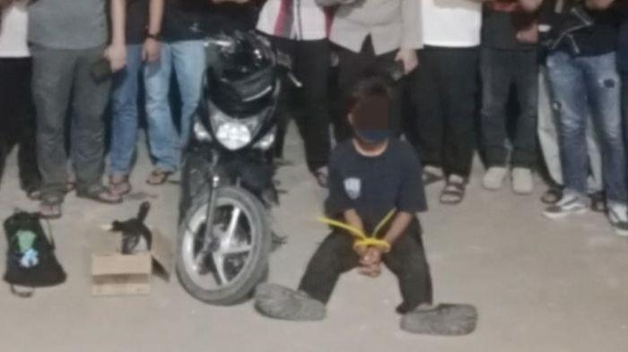 DIAMANKAN - Pelaku Saat Diamankan di Polres Ogan Ilir. Sadis! Remaja di Ogan Ilir Tega Racun Kekasihnya yang Hamil Hingga Tewas, Lalu Digantung di Pohon
