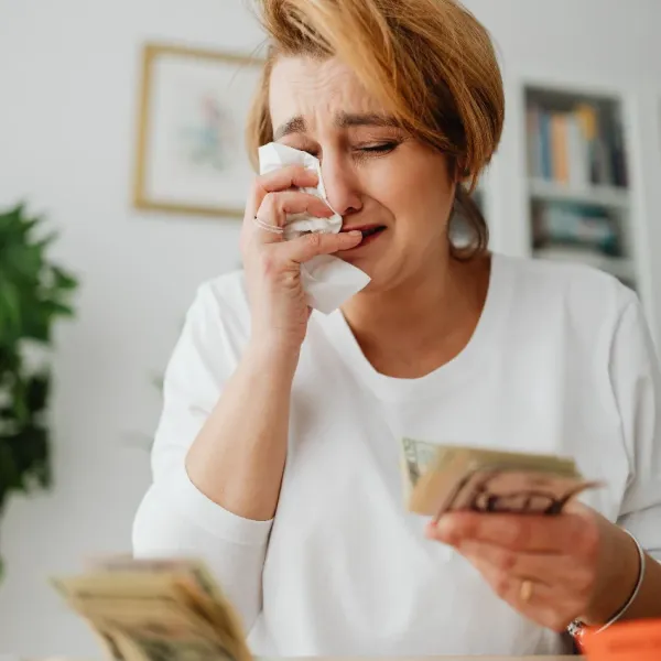 woman who can barely get by with the money she has