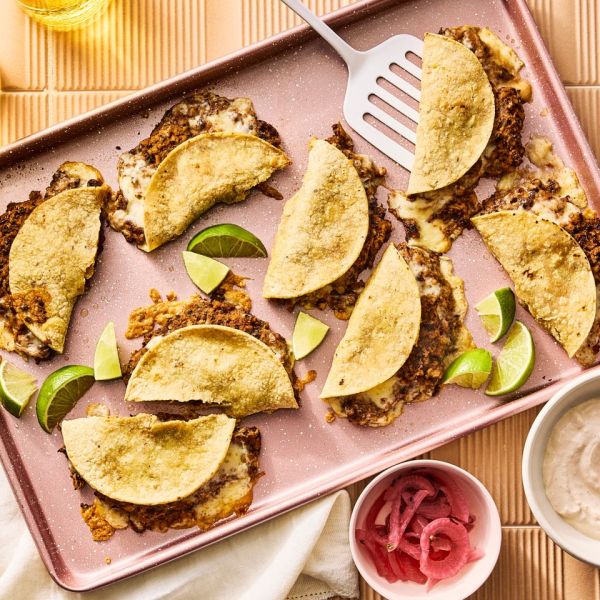 an image of the Sheet-Pan Crispy Black Bean Tacos Credit: Photographer: Morgan Hunt Glaze, Food Stylist: Julian Hensarling, Prop Stylist: Abby Armstrong