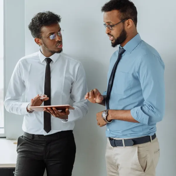 co-workers communicating about what they need