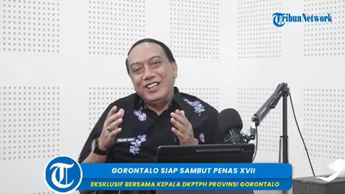 PENAS KTNA -- Ketua Panitia Pelaksana PENAS XVII, Muljady D Mario, saat mengisi program Tribun Podcast. Pemprov Gorontalo mematangkan persiapan PENAS XVII.