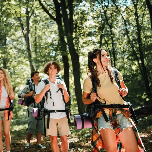 teenagers hiking on a sunny day 