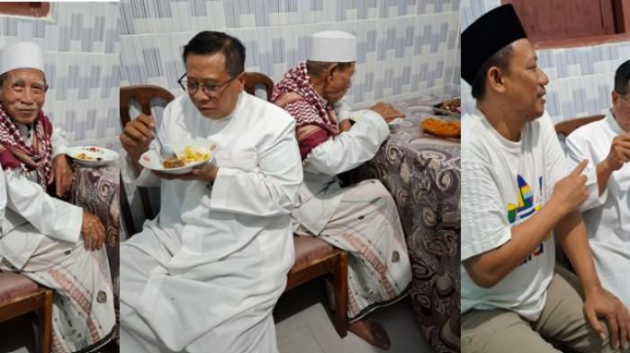 MAKAN MALAM - Romo Damianus Fadjar Tedjo Soekarno duduk saling berpunggungan dengan Ulama Kharismatik KH Fathulloh Suyuti Toha saat makan malam di ruang makan, Pondok Pesantren Mansyaul Huda, Banyuwangi, Minggu malam (14/6/2026).